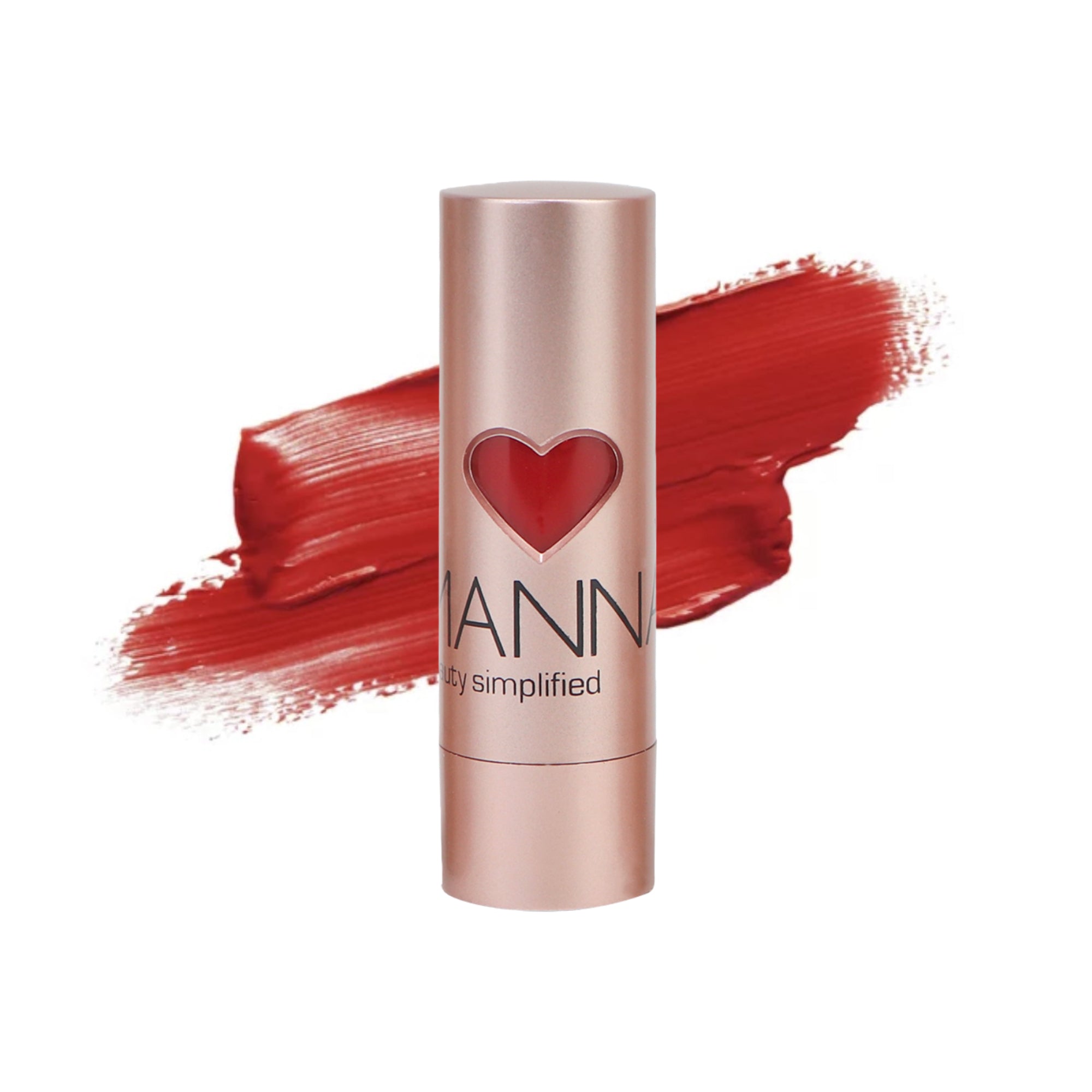 Manna Kadar bon Voyage Lip Stick in bright red in rose gold packaging with heart cutout showing the color inside