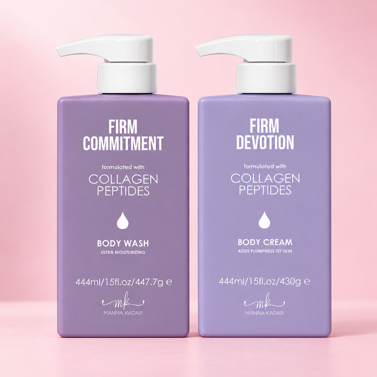 Manna Kadar Firm Commitment Body Wash and Firm Devotion Body Cream, two full-size lavender pump bottles on a soft pink background.
